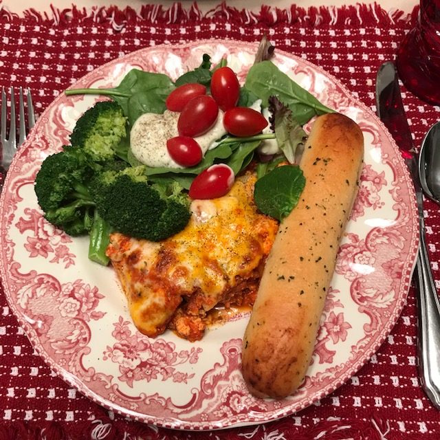 lasagna, broccoli, salad, bread stick