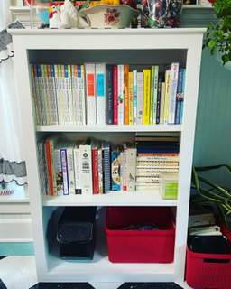 picture of bookcase with cookbooks