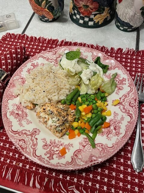 photo of dinner plate with salmon, rice, etc.