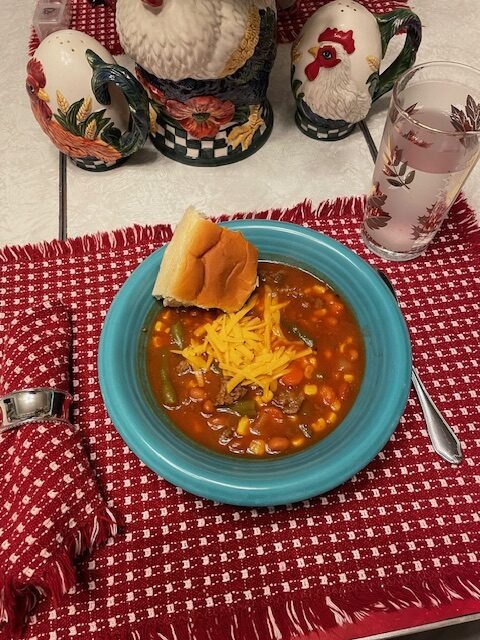 bowl with soup and roll